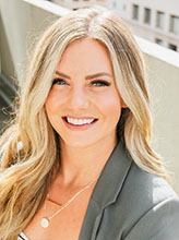 Professional headshot portrait of Katlyn
