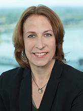 Professional headshot portrait of Pam