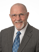 Professional headshot portrait of Robert