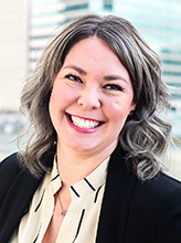 Professional headshot portrait of Tami