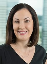 Professional headshot portrait of Traci