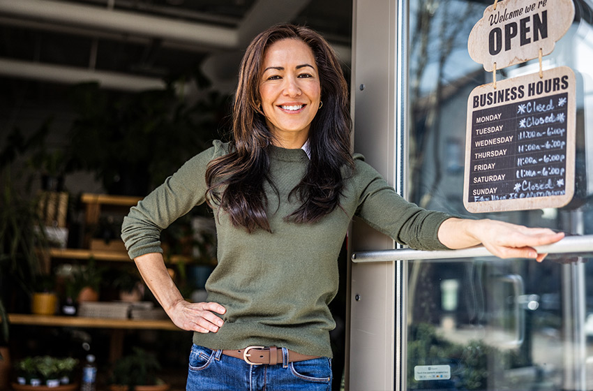 A women standing at the counter during her workday