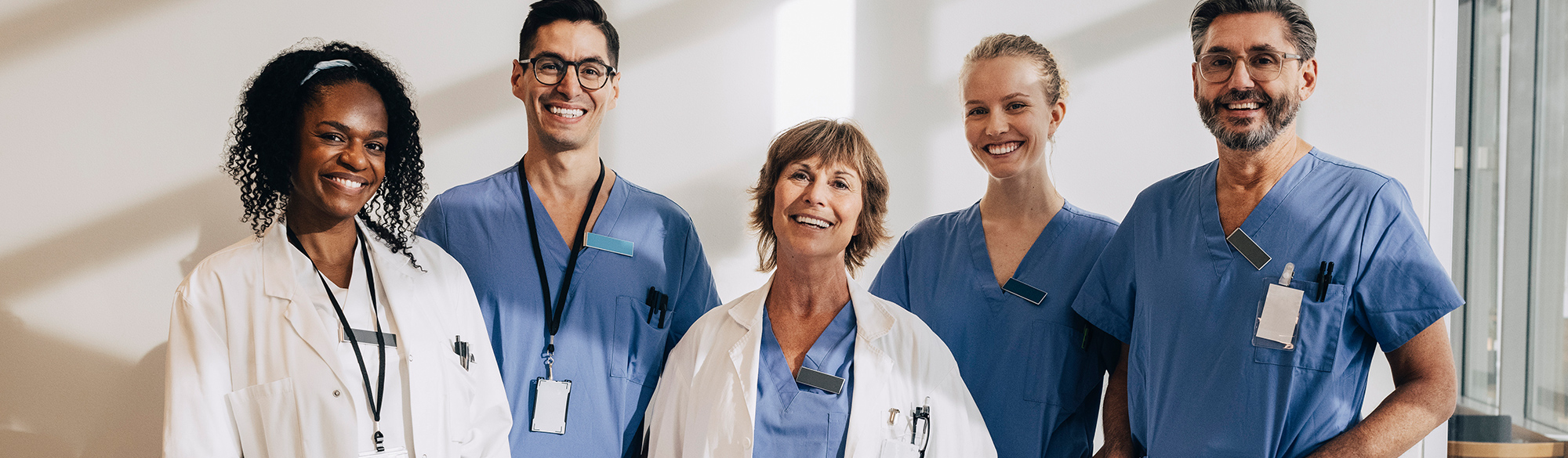 Diverse group of healthcare professionals looking at the viewer