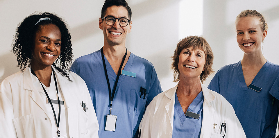 Diverse group of healthcare professionals looking at the viewer