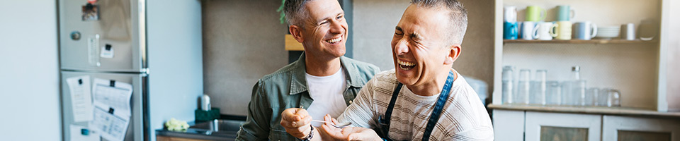 Oregon men laughing in kitchen banner